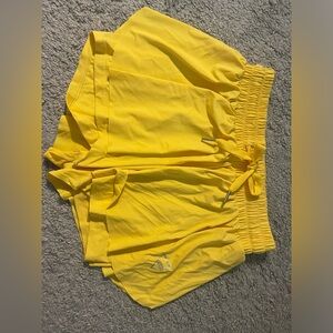 *used once* Yellow butterfly athletic shorts. Great condition!